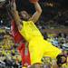 Michigan sophomore Jon Horford dunks the ball around   Ohio State junior Deshaun Thomas during the second half at Crisler Center on Tuesday, Feb. 5. Melanie Maxwell I AnnArbor.com
